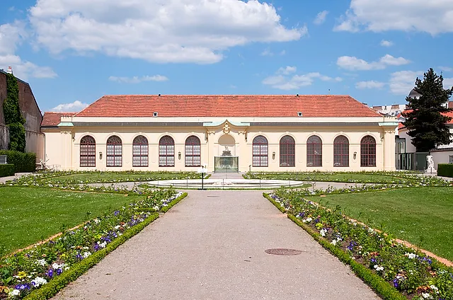 The Orangery of the Lower Belvedere at the end of a garden path